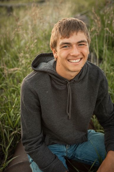 A picture containing grass, person, outdoor, child

Description automatically generated